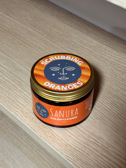Sanura Scrubbing Oranges